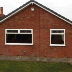 Casement windows with decorative panels