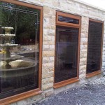 Large timber effect uPVC casement windows