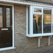 Front windows and black composite door