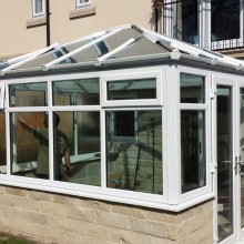 White conservatory with French doors